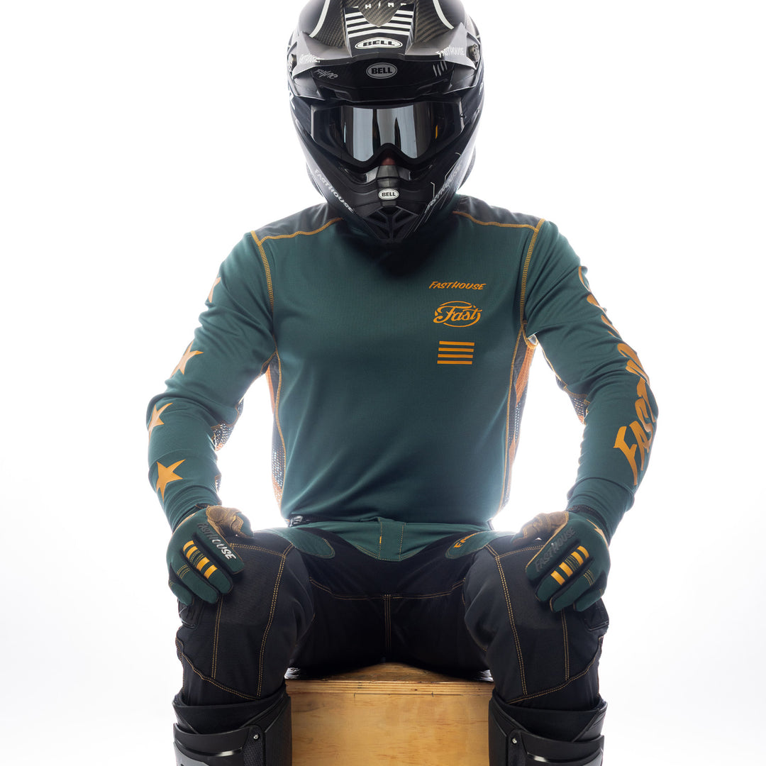 Fasthouse Grindhouse Ramone Jersey Pine/Black - Front View of Model Sitting While Wearing Jersey