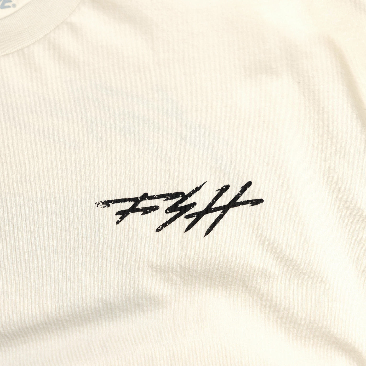 Fasthouse Hideout SS Tee Natural - Close-Up of Graphic on Front