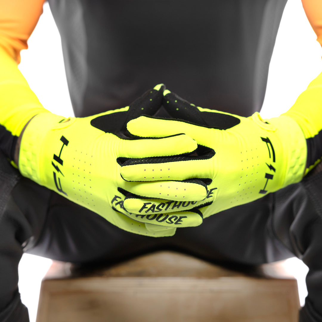 Fasthouse Helix Circuit Gloves High-Viz - Close-Up of Model Wearing Gloves, Fingers Entwined