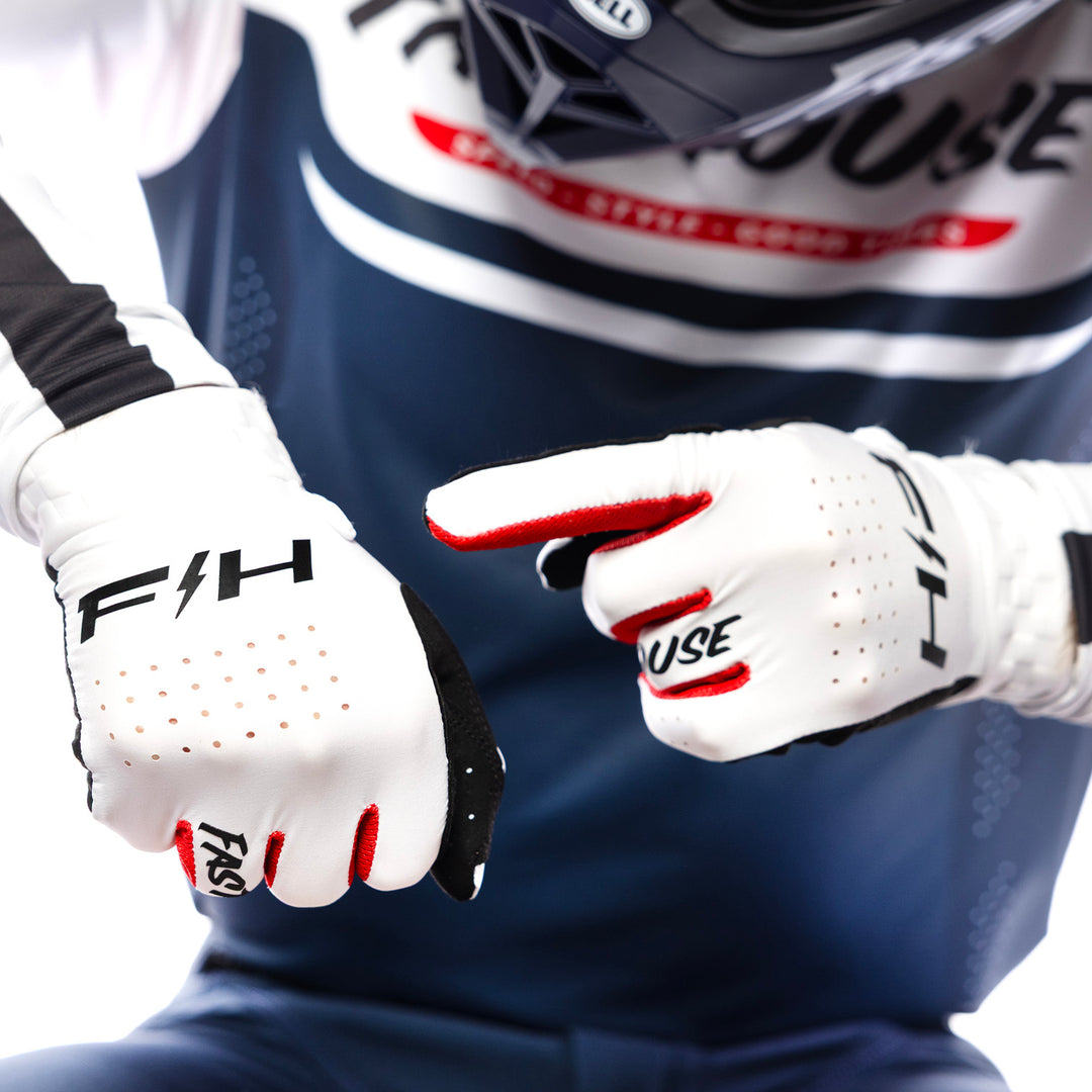 Fasthouse Helix Circuit Gloves White - Close-Up of Model Wearing Gloves, Left Hand Pointing at Back of Right Hand