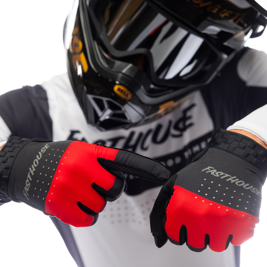 Fasthouse Helix Monaco Gloves Red/Black - Close-Up of Model with Gloved Hands, Pointing with One at Back of Other