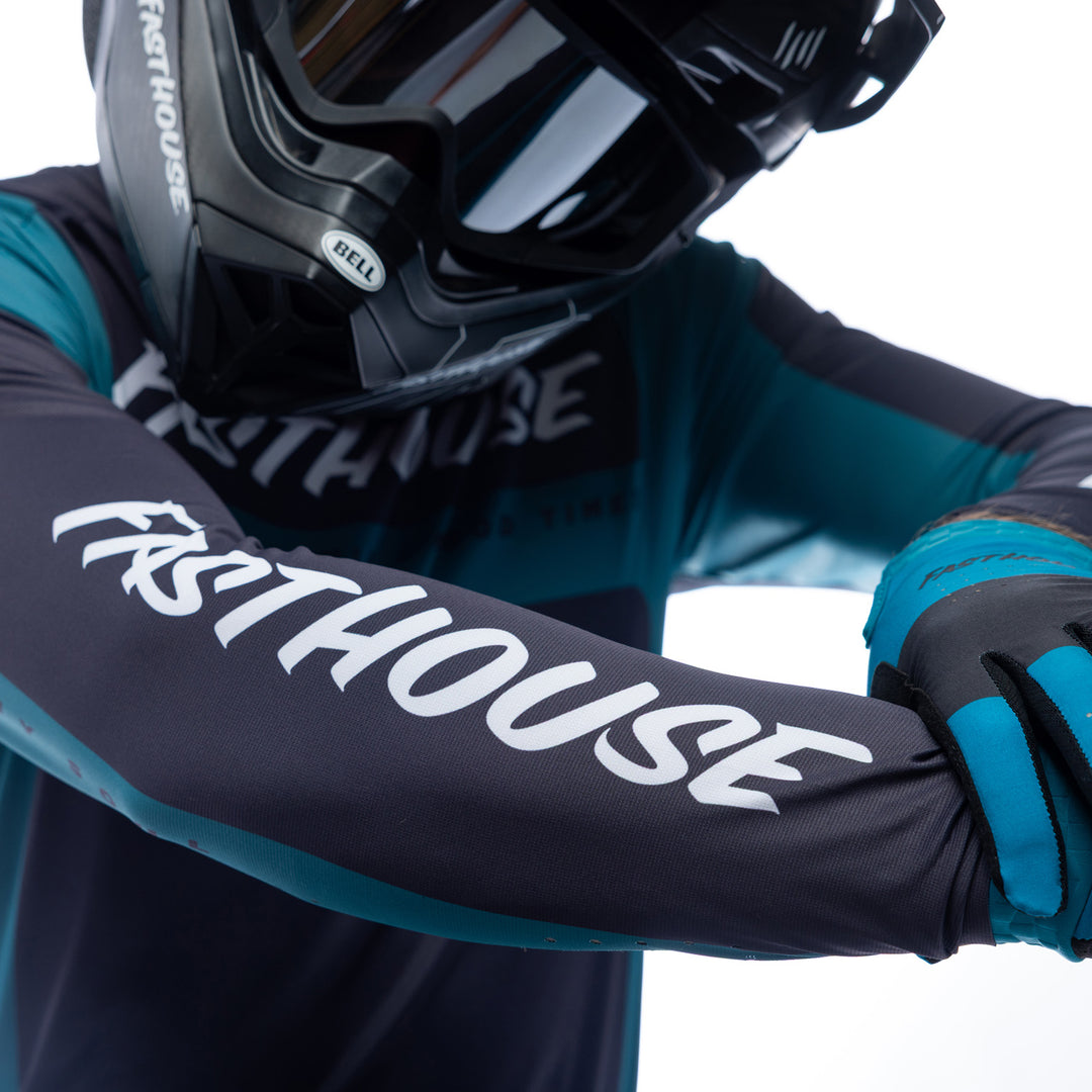 Fasthouse Helix Monaco Jersey Marine/Black - Close-Up of Model Showing Sleeve Logo Graphic