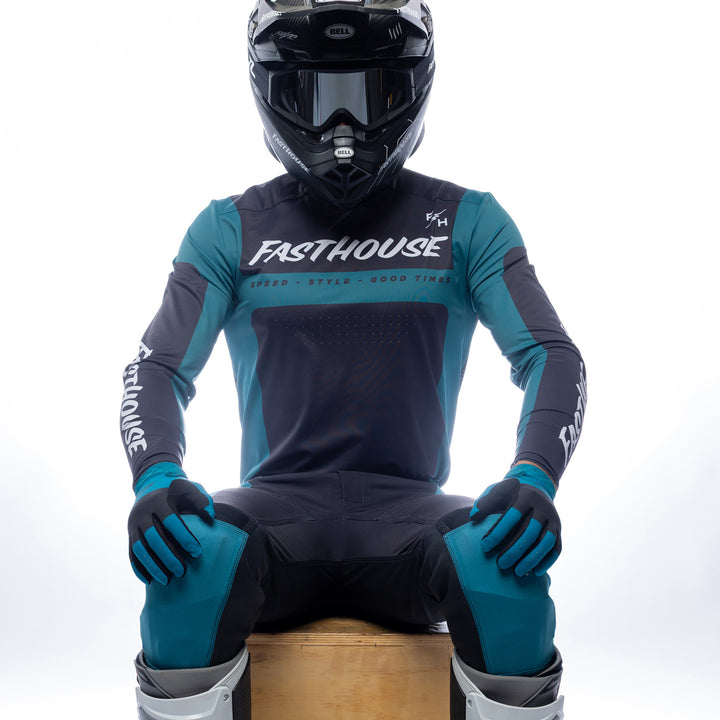 Fasthouse Helix Monaco Jersey Marine/Black - Front View of Model Sitting While Wearing Jersey