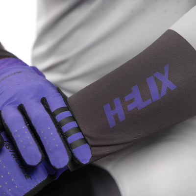 Fasthouse Helix Podium Jersey Gray/Black/Purple - Close-Up of Forearm Graphic