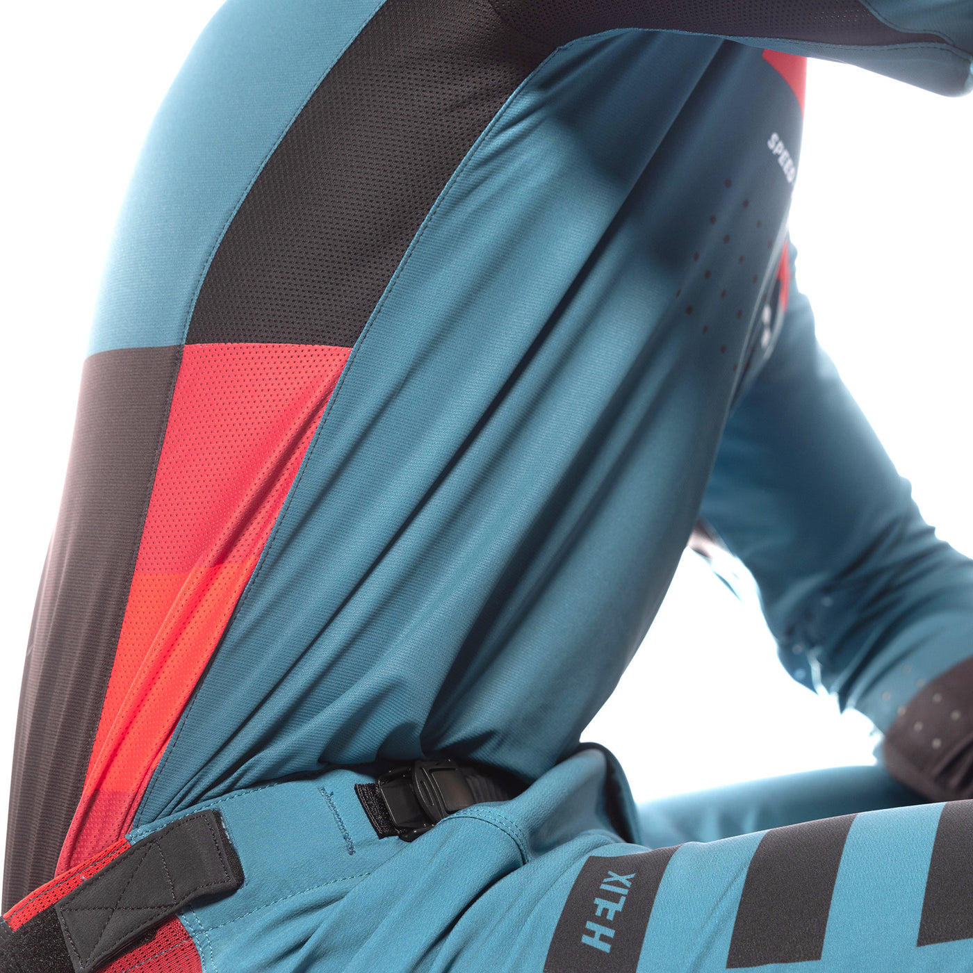 Fasthouse Helix Podium Jersey Red/Black/Teal - Close-Up of Rib and Armpit Side Details