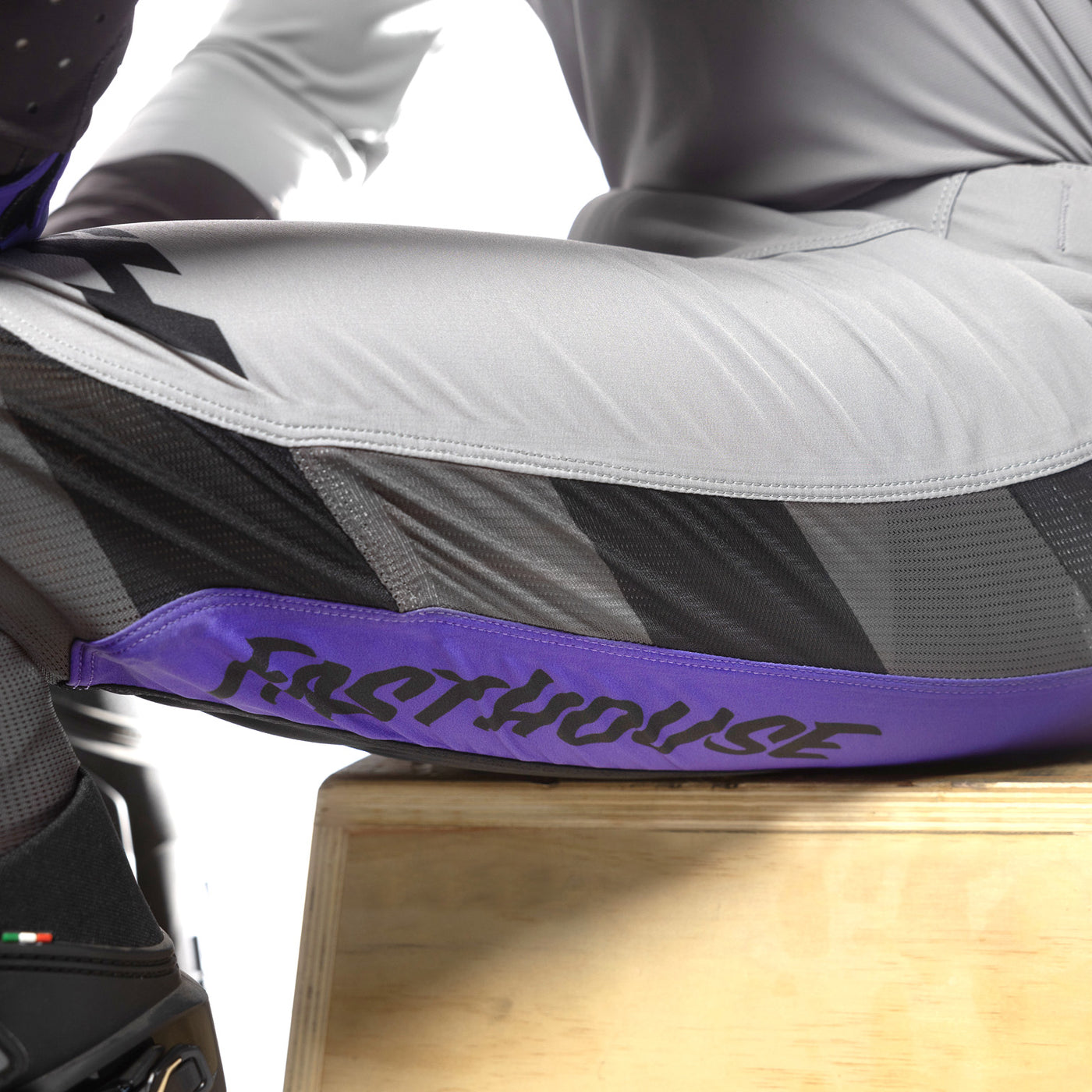 Fasthouse Helix Podium Pant Gray/Black/Purple - Close-Up of Left Thigh Graphics