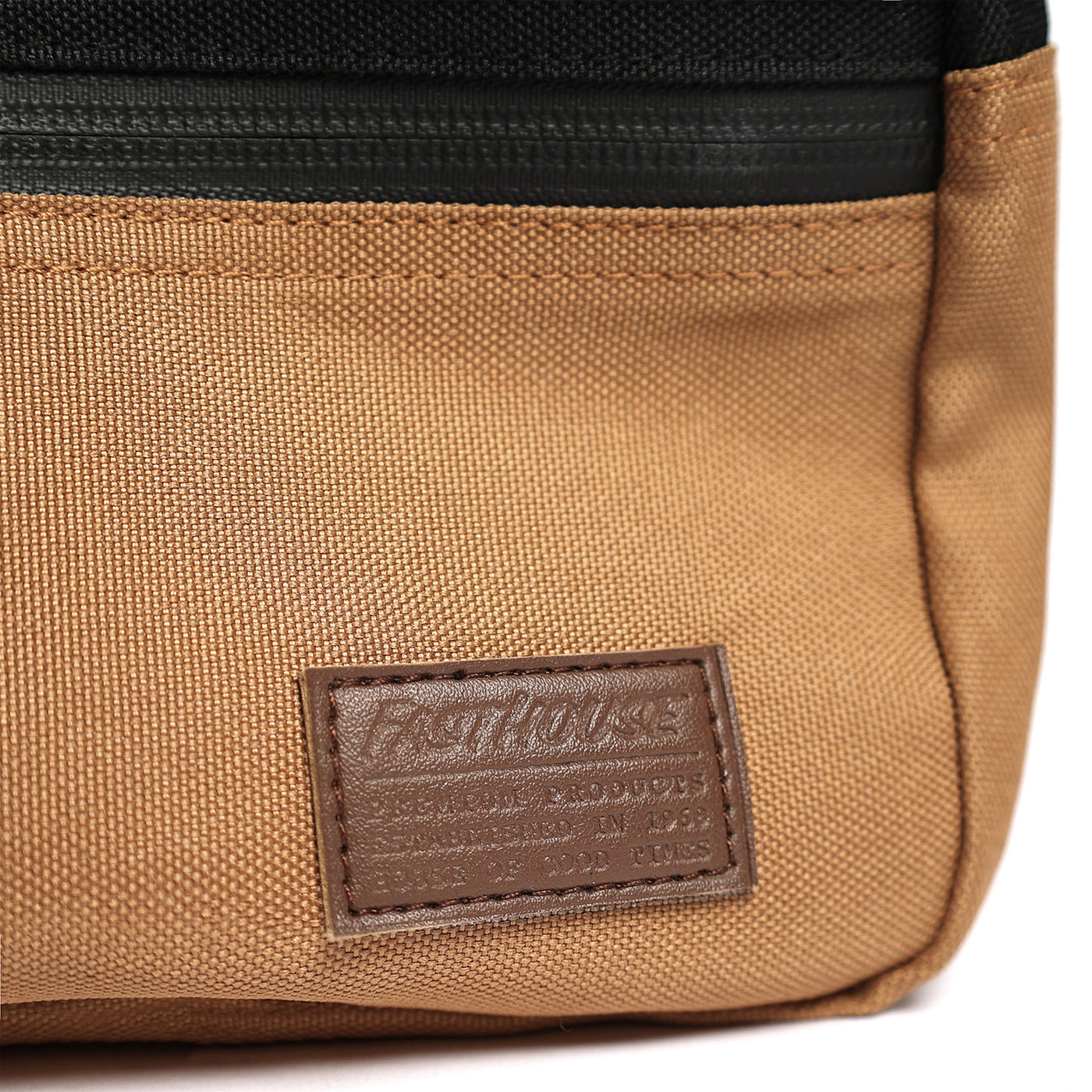 Fasthouse Hanger Toiletry Bag - Close-Up of Logo Patch on Front