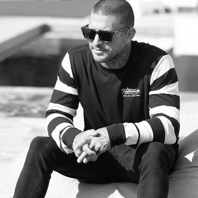 Fasthouse Jailbreak Stripes Long Sleeve Tee Black - Lifestyle Shot of Model Wearing Tee