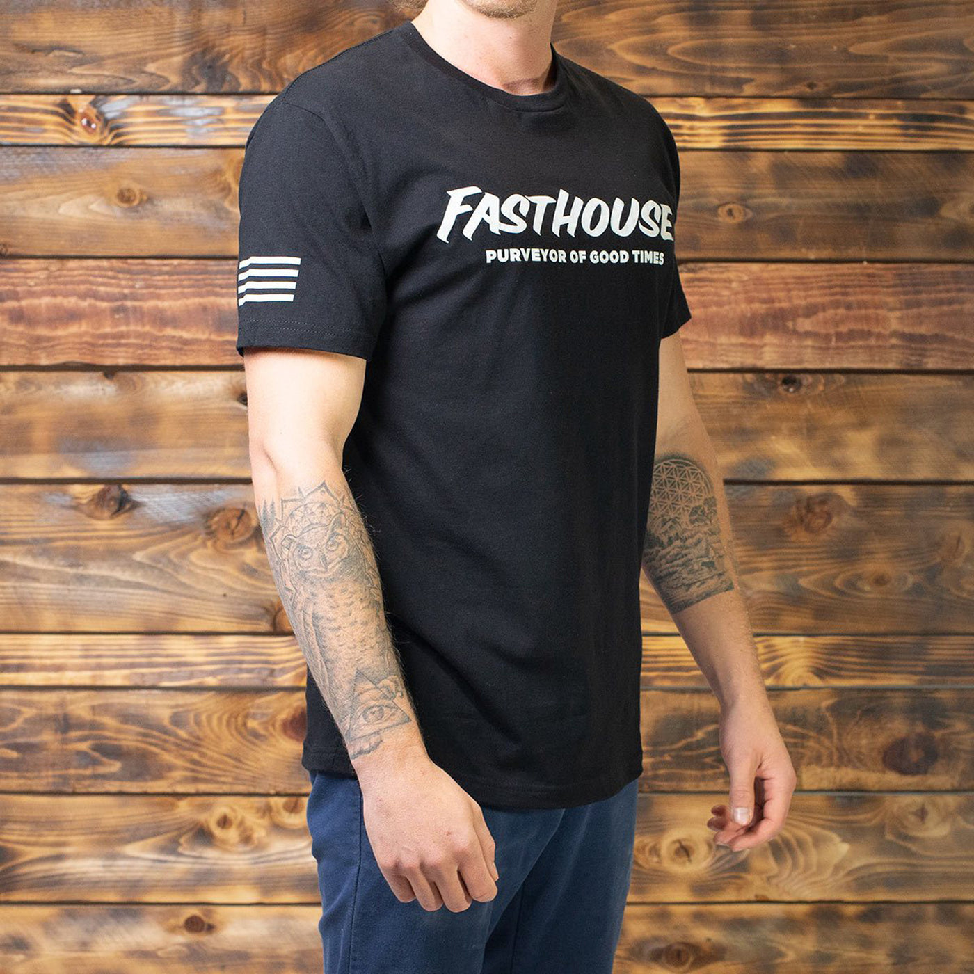 Fasthouse Logo Tee Black - Front Side View of Model Wearing Tee