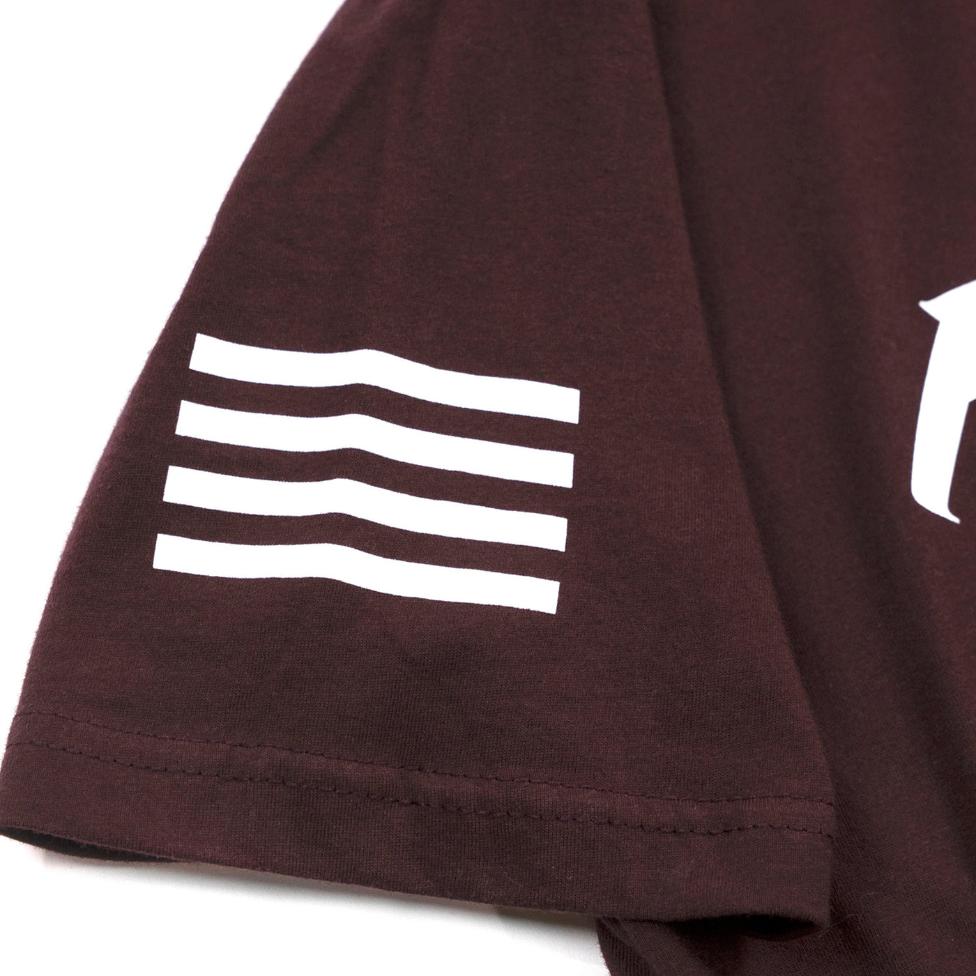 Fasthouse Logo Tee Light Oxblood - Close-Up of Graphic on Right Sleeve