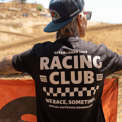 Fasthouse Members Only Tee Black - Lifestyle Shot from Rear of Model Wearing Tee at Dirt Track