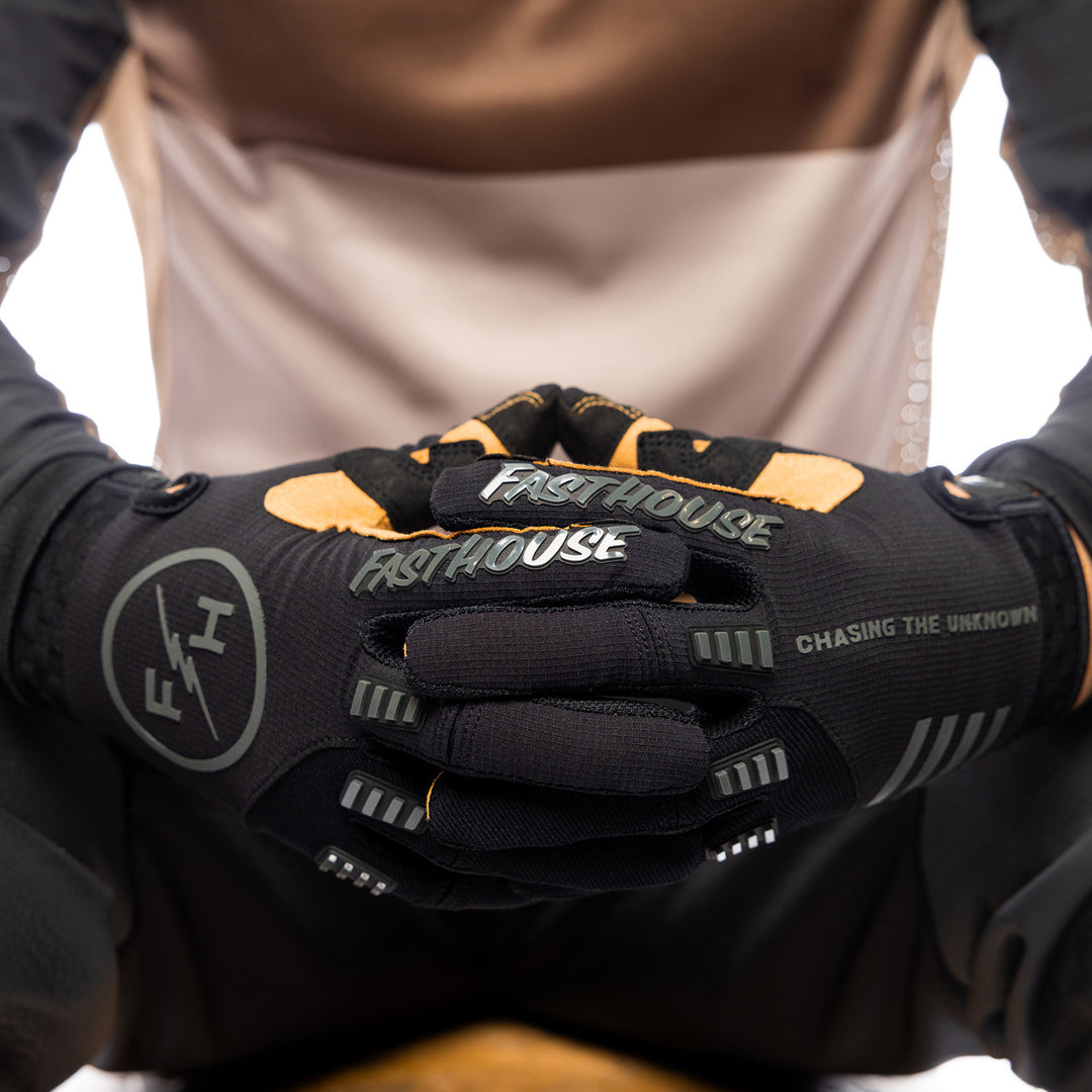 Fasthouse Off-Road Matox Gloves Black/Gray - Close-Up of Model's Gloved Hands Together, Fingers Entwined