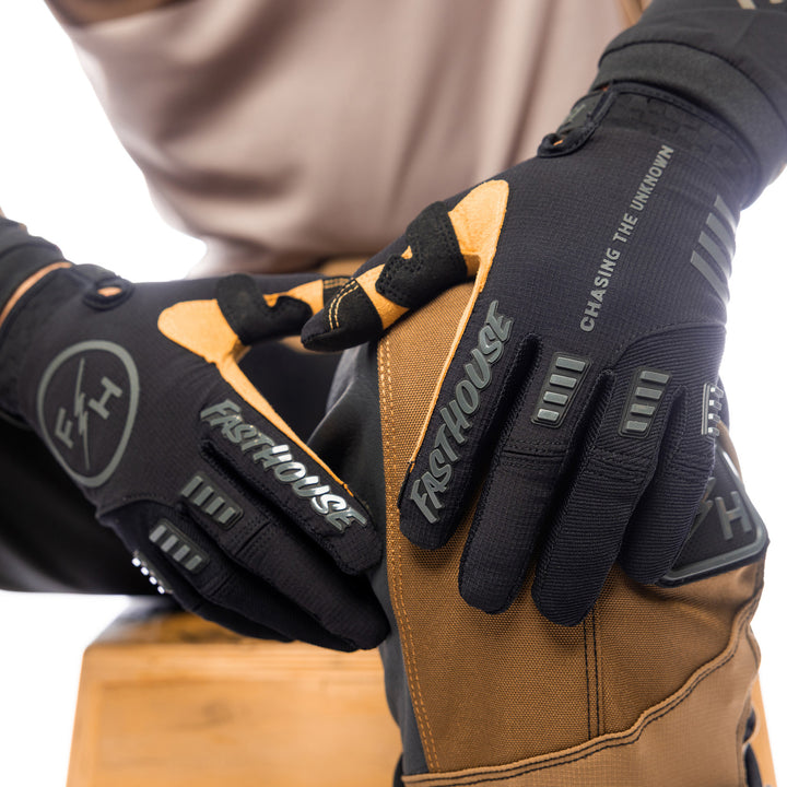 Fasthouse Off-Road Matox Gloves Black/Gray - Close-Up of Model's Gloved Hands Resting on Knee