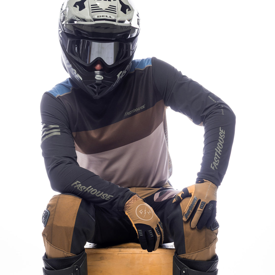 Fasthouse Off-Road Matox Jersey Moss/Black - Front View of Model Sitting While Wearing Jersey