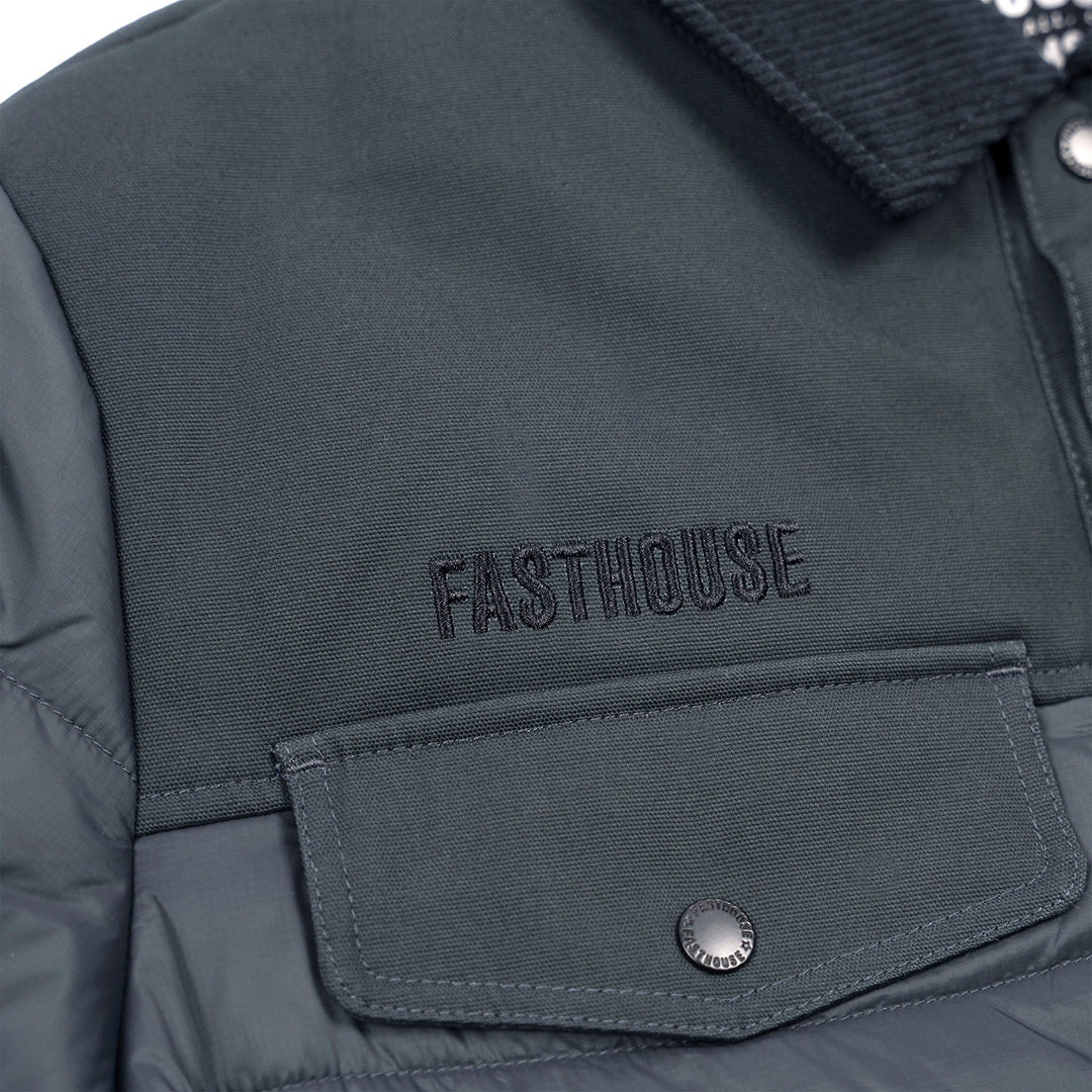 Fasthouse Prospector Puffer Jacket Smoked Navy - Close-Up of Stitched Logo on Chest