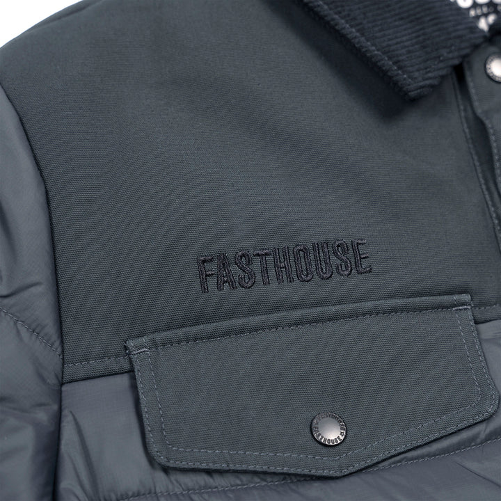Fasthouse Prospector Puffer Jacket Smoked Navy - Close-Up of Stitched Logo on Chest
