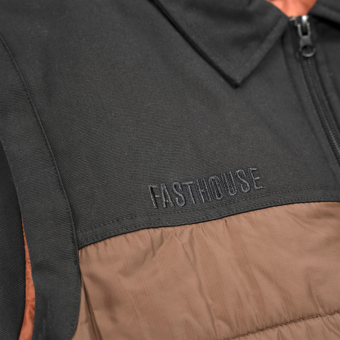 Fasthouse Prospector Puffer Vest Black/Brown - Close-up of stitched Logo on chest
