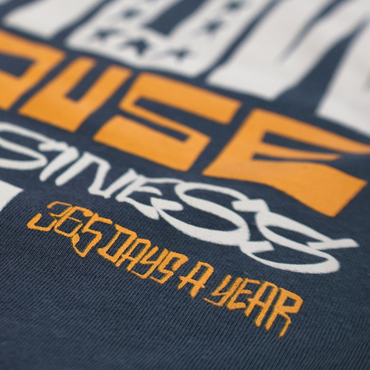 Fasthouse Resort Stunt Show Tee Indigo - Close-Up of "365 Days a Year" Lettering in Back Graphic