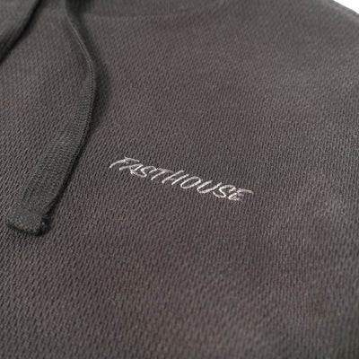 Fasthouse Robin Hooded Thermal Black - Close-Up of Stitched Logo on Front Chest