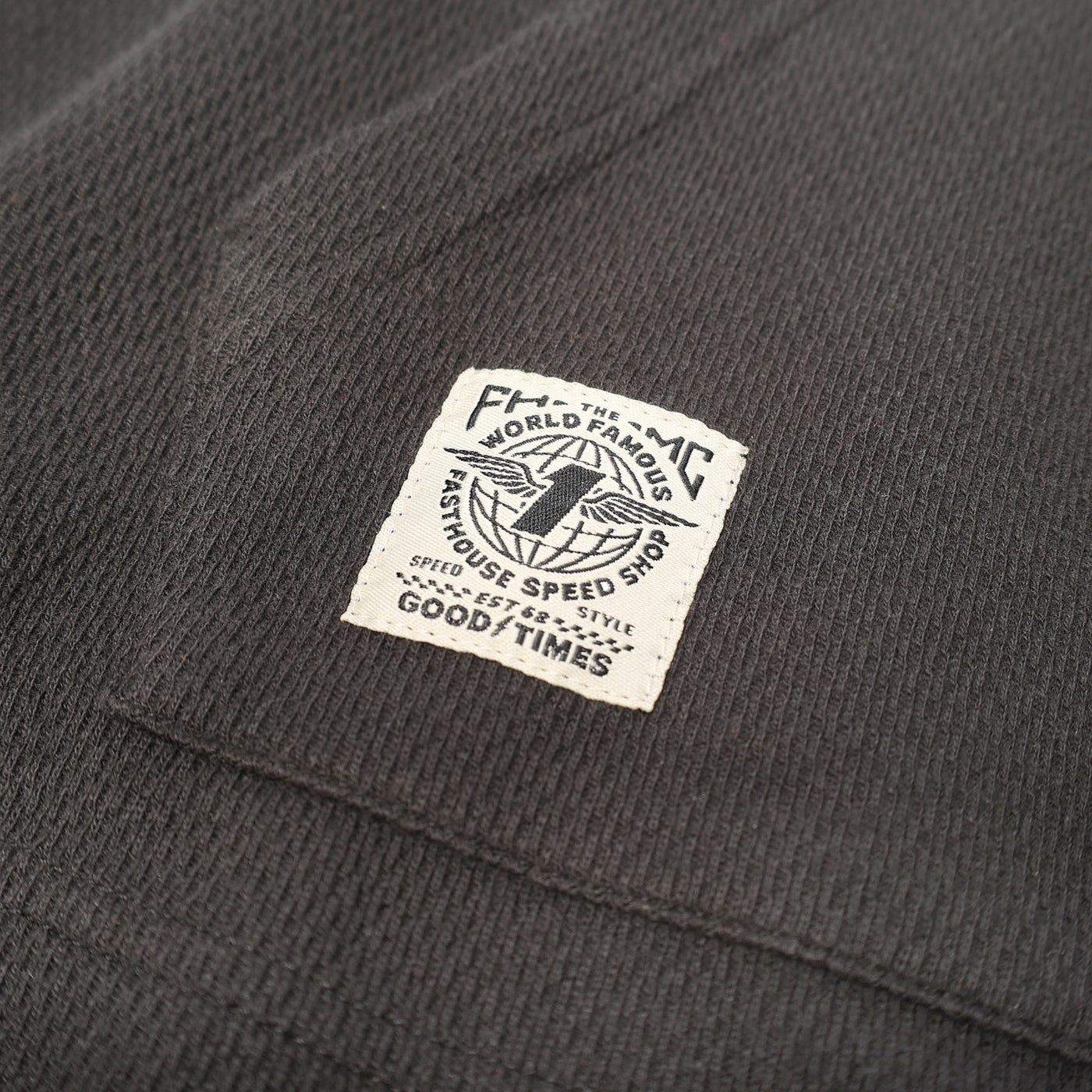 Fasthouse Robin Hooded Thermal Black - Close-Up of Patch Label on Kangaroo Pocket