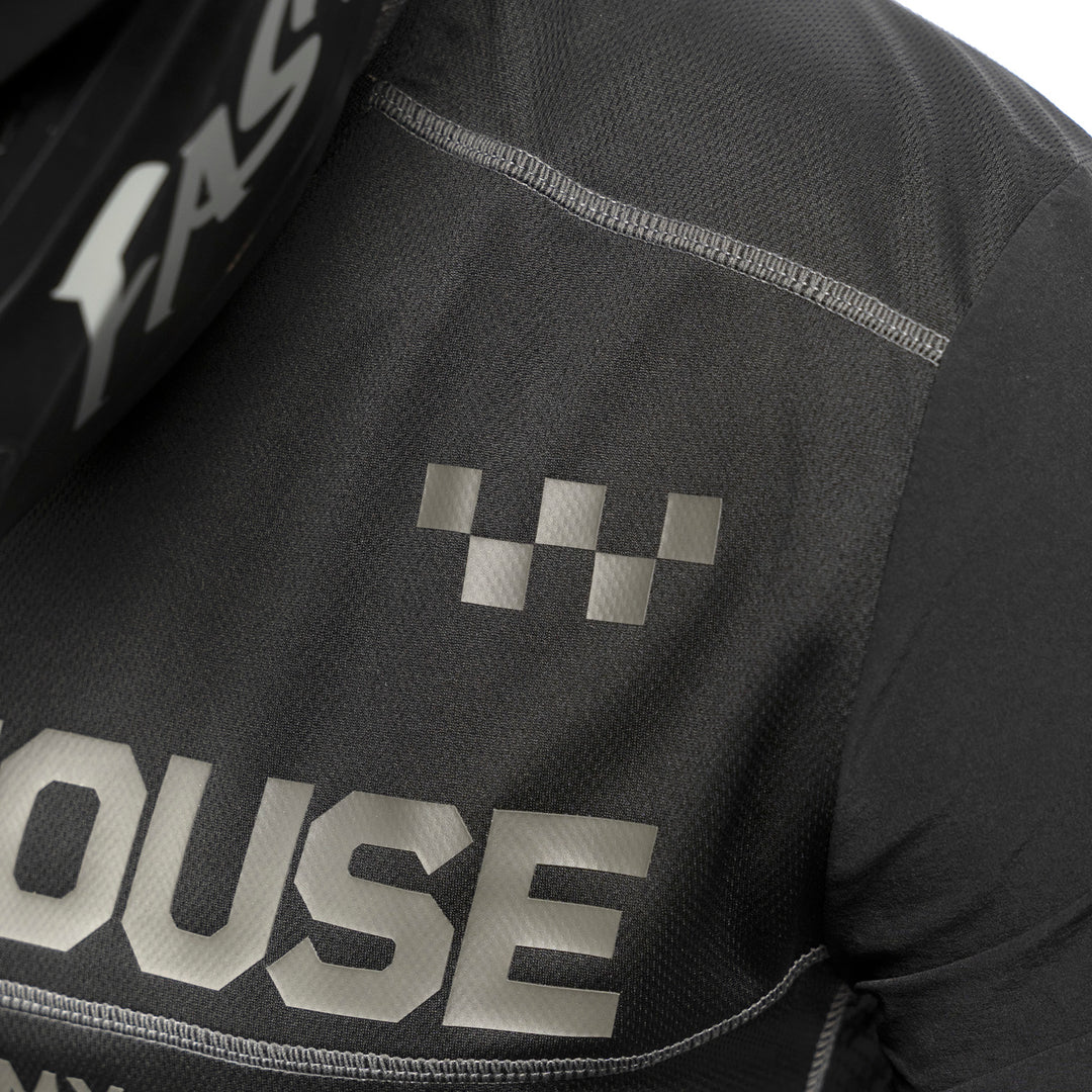 Fasthouse Off-Road Sand Cat Jersey Black/Black - Close-Up of Shoulder Chest Graphic