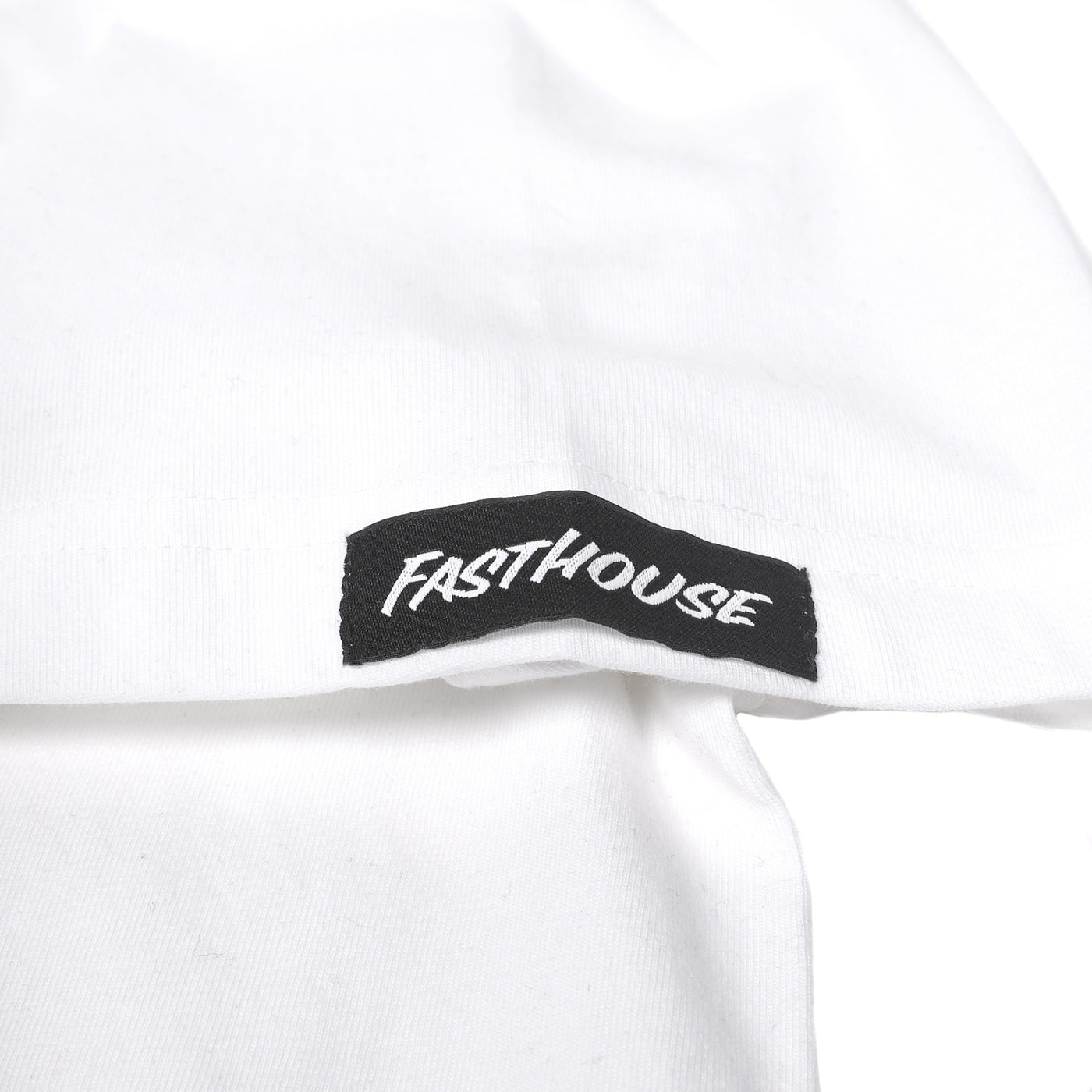 Fasthouse Savanna SS Tee White - Close-Up of Logo Tag Sewn into Sleeve