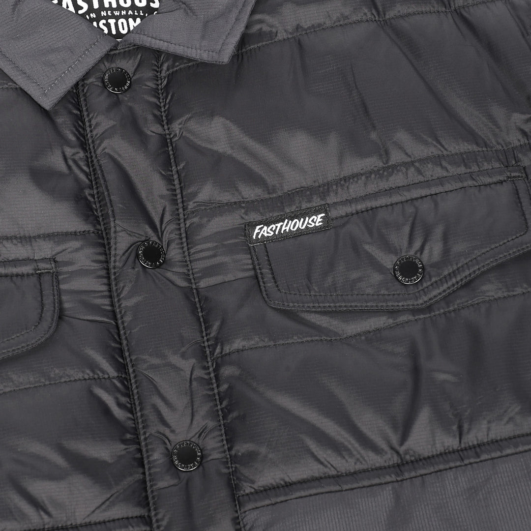 Fasthouse Sequoia Jacket Black/Black - Close-Up of Front Pocket with Logo Tag