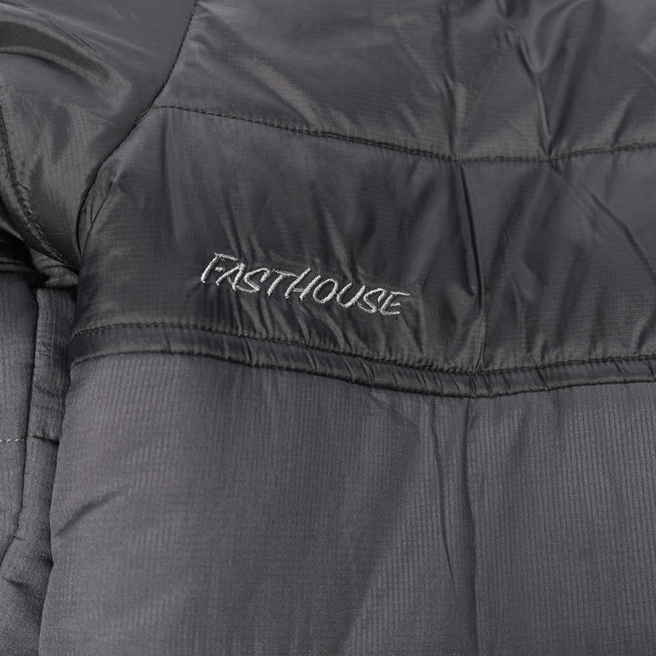 Fasthouse Sequoia Jacket Black/Black - Close-Up of Stitched Logo on Rear Left Shoulder
