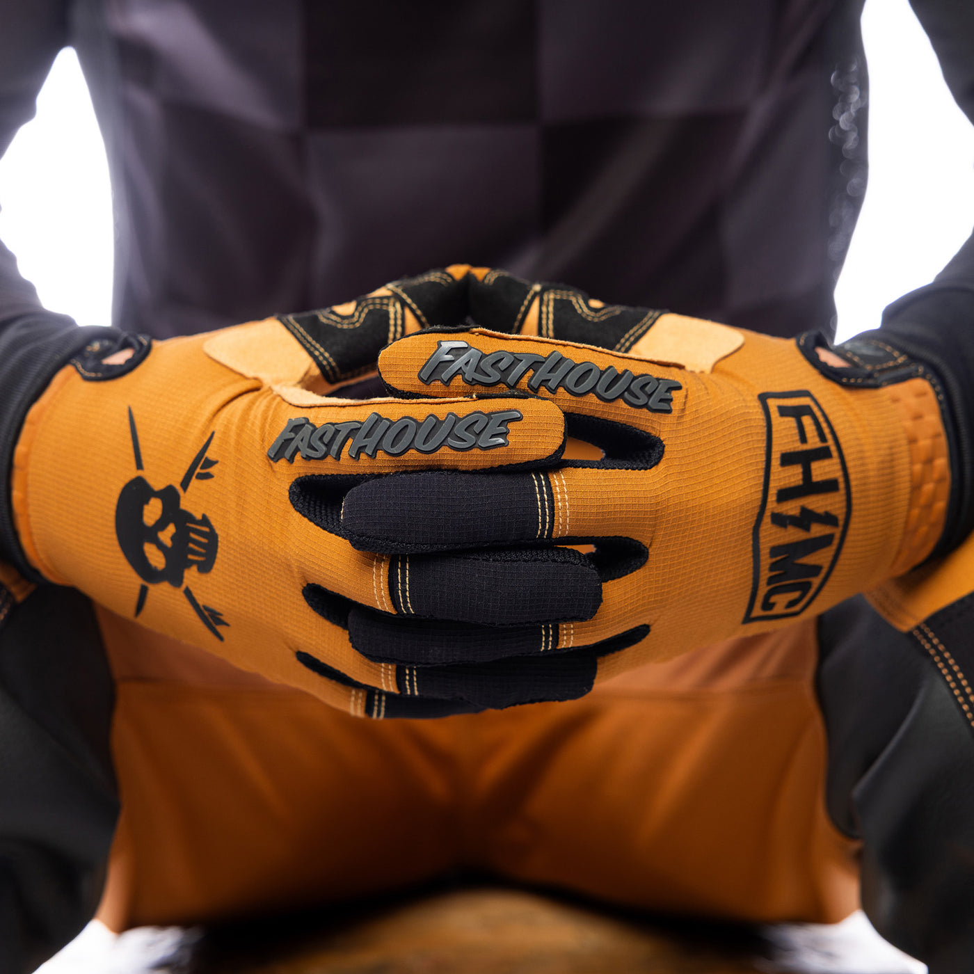 Fasthouse Sanguaro Bennet Gloves Camel - Close-Up of Model's Gloved Hands Together, Fingers Entwined