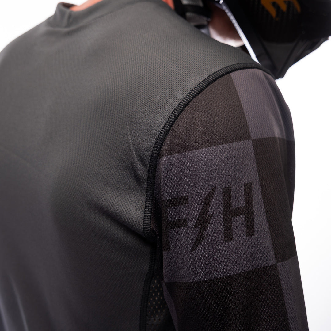 Fasthouse Sanguaro Tasker Jersey Charcoal - Close-Up of Upper Sleeve Graphics