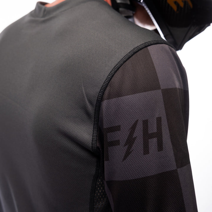 Fasthouse Sanguaro Tasker Jersey Charcoal - Close-Up of Upper Sleeve Graphics