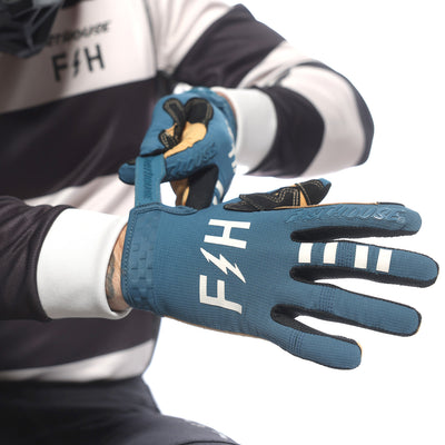 Fasthouse Speed Style Camino Gloves Teal - Close-Up of Model Adjusting Glove's Wrist Strap