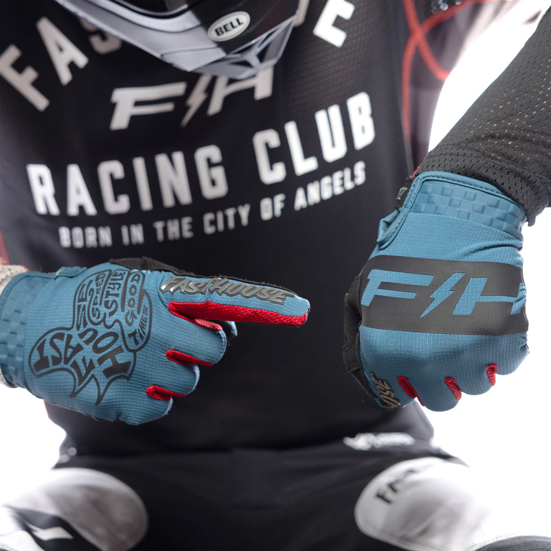 Fasthouse Speed Style Club Gloves Teal - Close-Up of Model Wearing Gloves, Pointing with Right Hand at Back of Left Hand