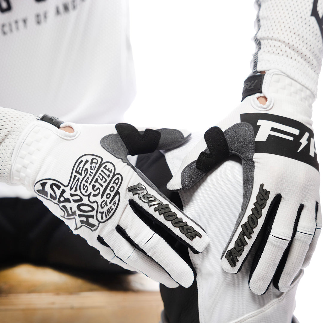 Fasthouse Speed Style Club Gloves White - Close-Up of Model Wearing Gloves, Resting Hands on Left Knee