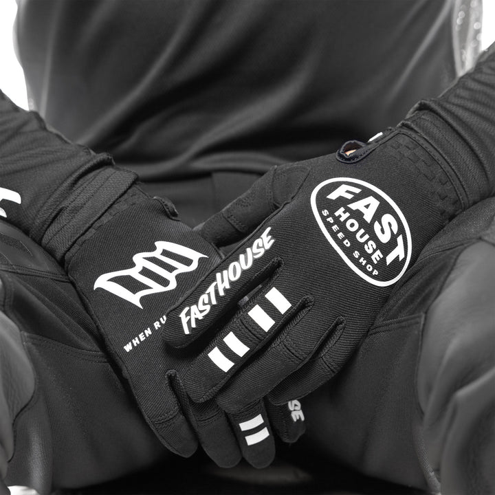 Fasthouse Speed Style Ramble Gloves Black - Close-Up of Model Wearing Gloves, Hands Resting in Lap