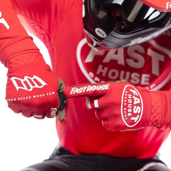 Fasthouse Speed Style Ramble Gloves Red - Close-Up of Model Wearing Gloves, Left Hand Pointing at Back of Right Hand
