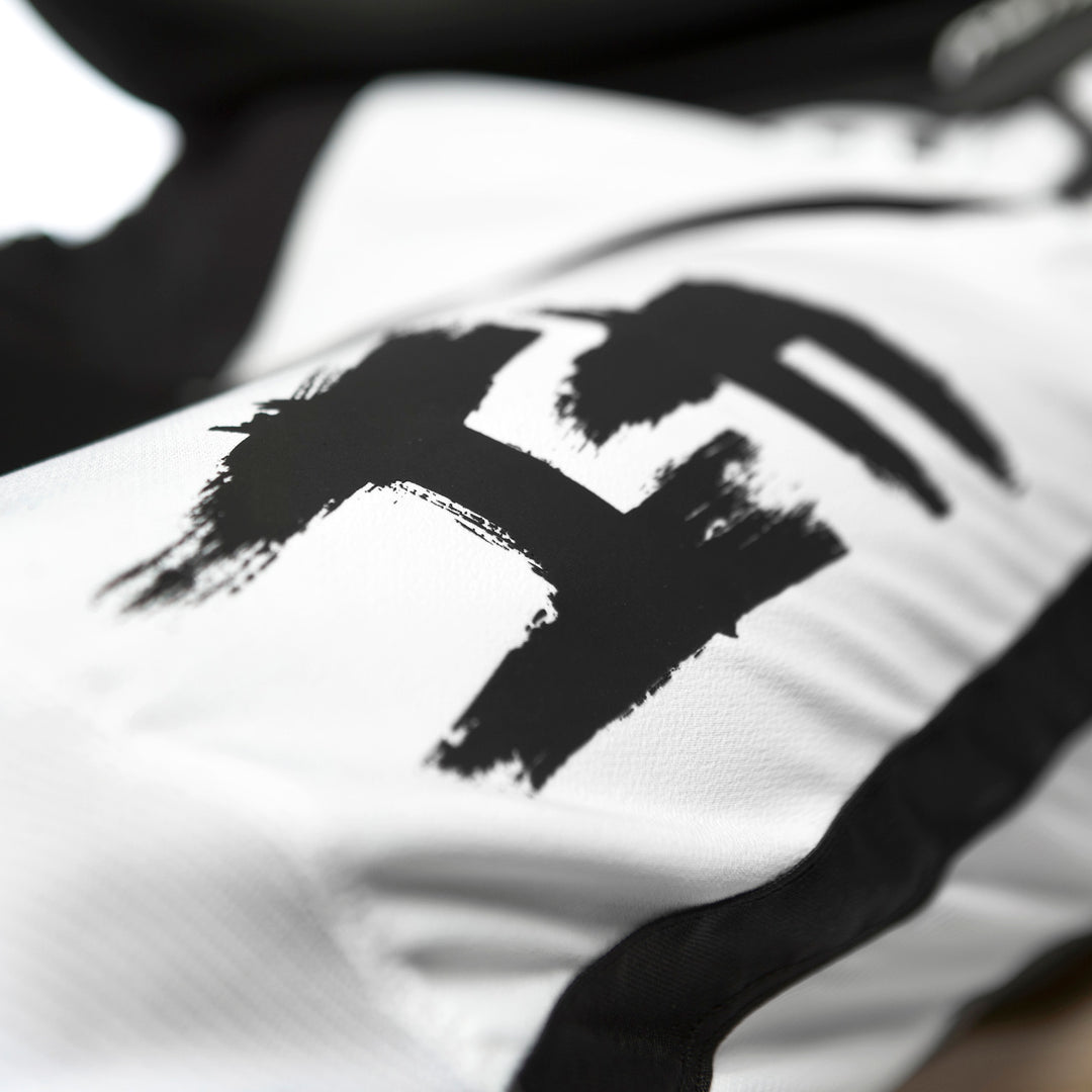 Fasthouse Speed Style Jester Pant Black/White - Close-Up of Left Thigh Graphic