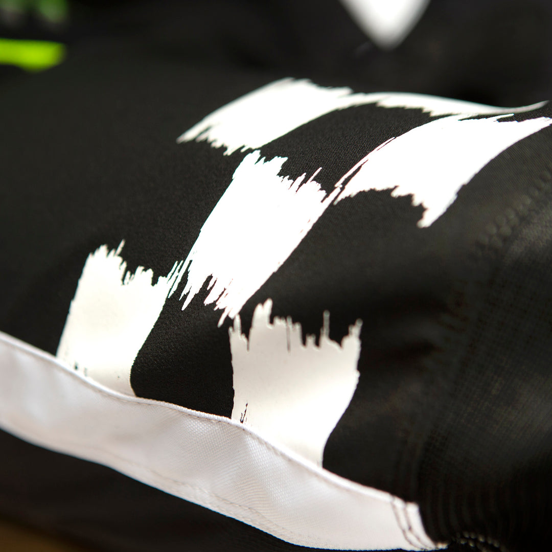 Fasthouse Speed Style Jester Pant Black/White - Close-Up of Right Thigh Graphic