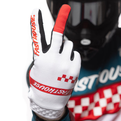 Fasthouse Speed Style Mod Gloves Red/White - Close-Up of Model's Gloved Hand Throwing Peace Sign