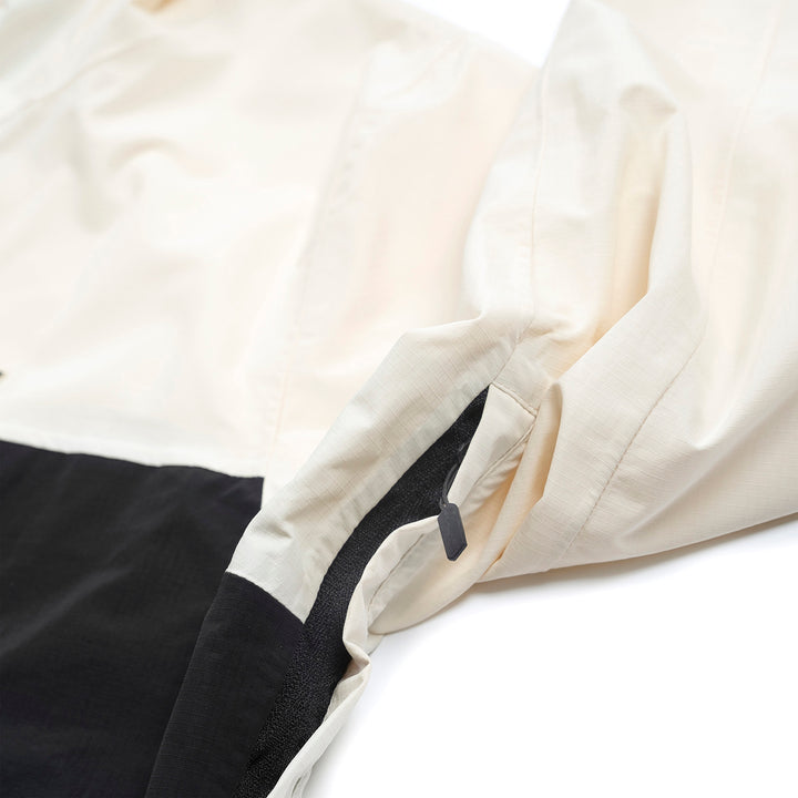 Fasthouse Statement Packable Windbreaker Natural/Black - Close-Up of Pocket Zipper