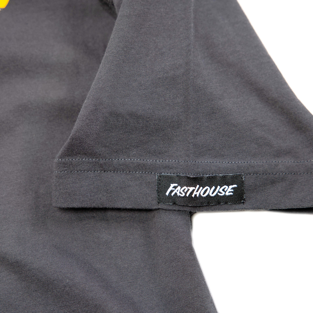 Fasthouse Stinger SS Tee Graphite Black - Close-Up of Logo Tag on Sleeve