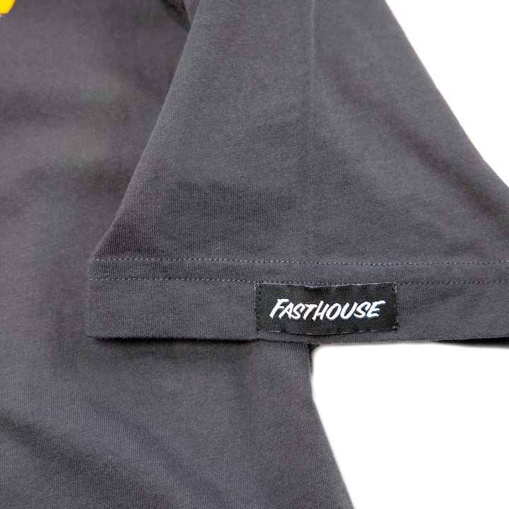 Fasthouse Stinger SS Tee Graphite Black - Close-Up of Logo Tag on Sleeve