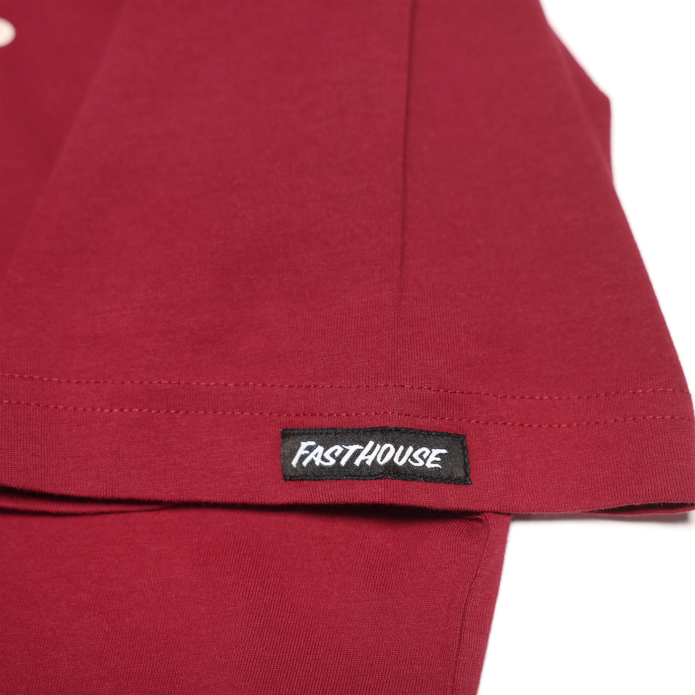 Fasthouse Tavern Tee Cardinal - Close-Up of Tag Sewn into Sleeve Hem