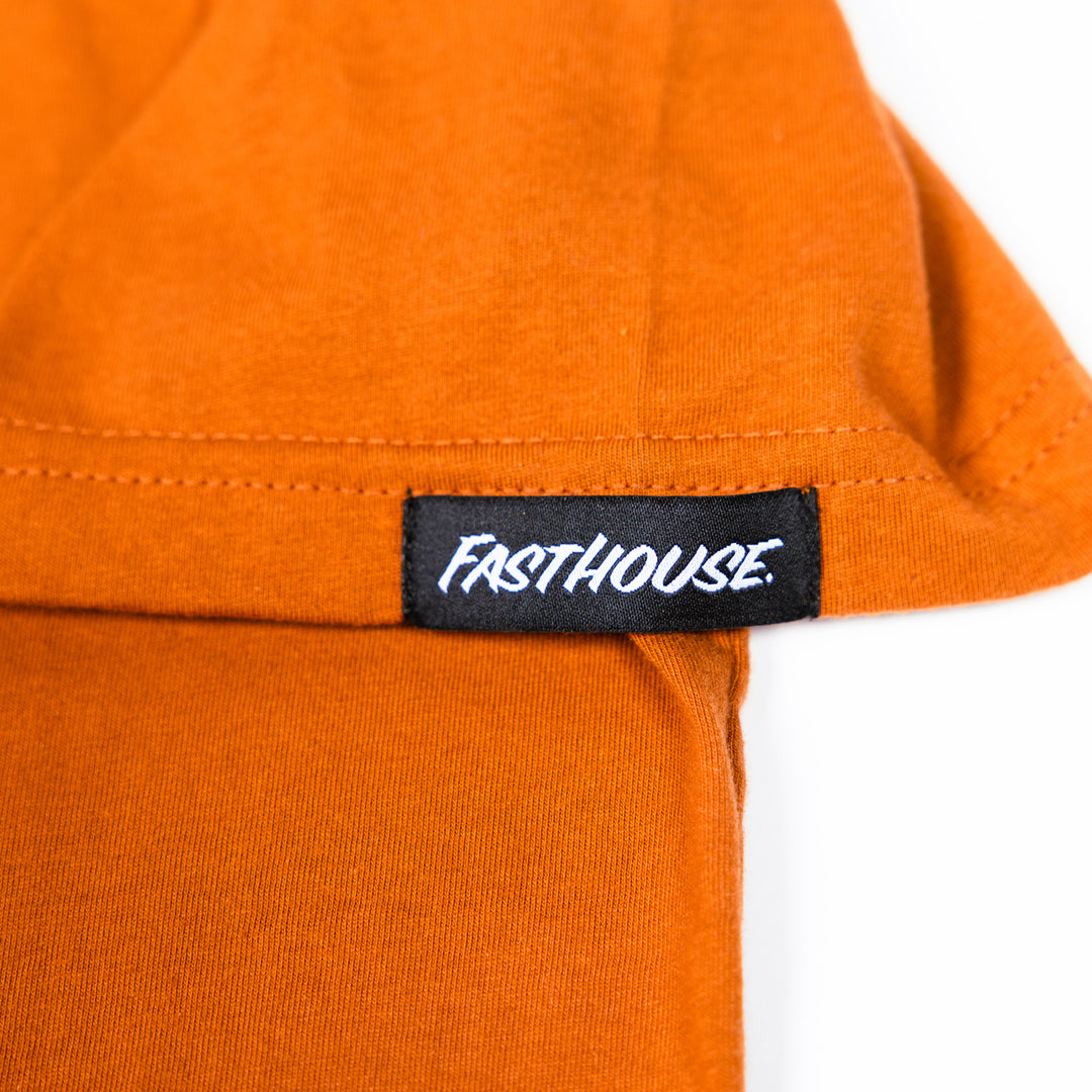 Fasthouse Virtue SS Tee Rust - Close-Up of Logo Tag on Sleeve