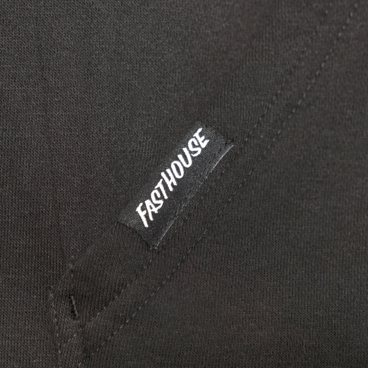 Fasthouse Weekend Hooded Pullover Black - Close-Up of Sewn-In Tag on Pocket