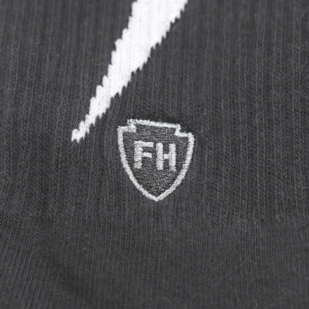 Fasthouse Wired Socks Black - Close-Up of Stitched Logo
