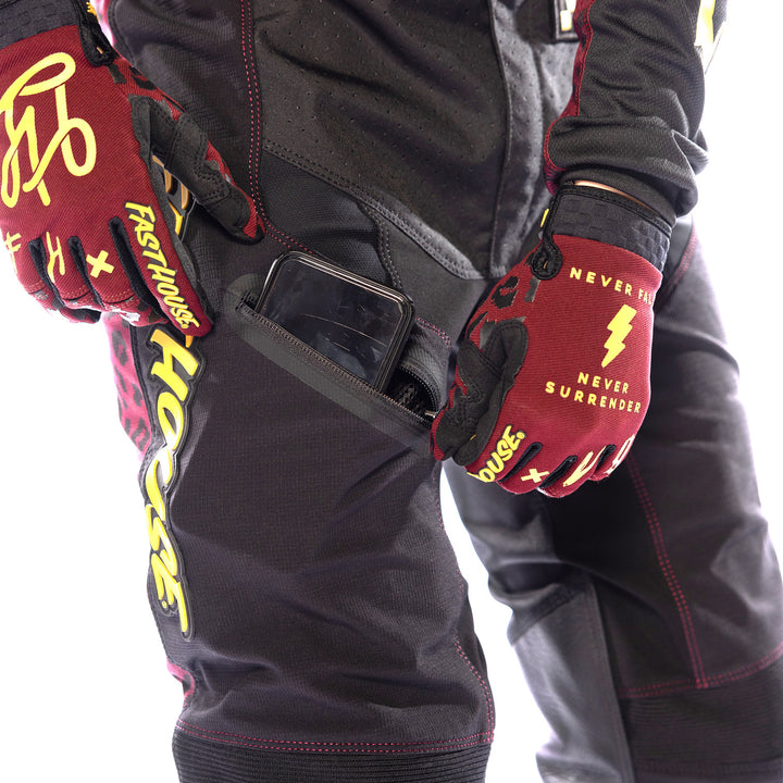 Fasthouse Women's Elrod Golden Pant Black - Close-up of Phone in Thigh Pocket