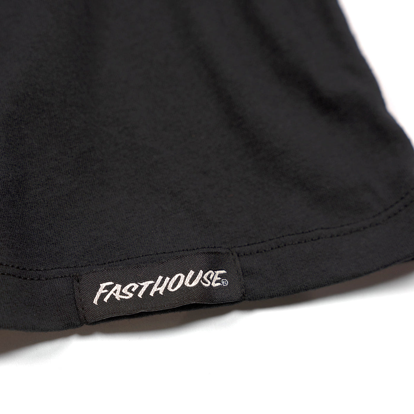 Fasthouse Women's Members Only Crop Tee Black - Close-Up of Tag Sewn into Hem