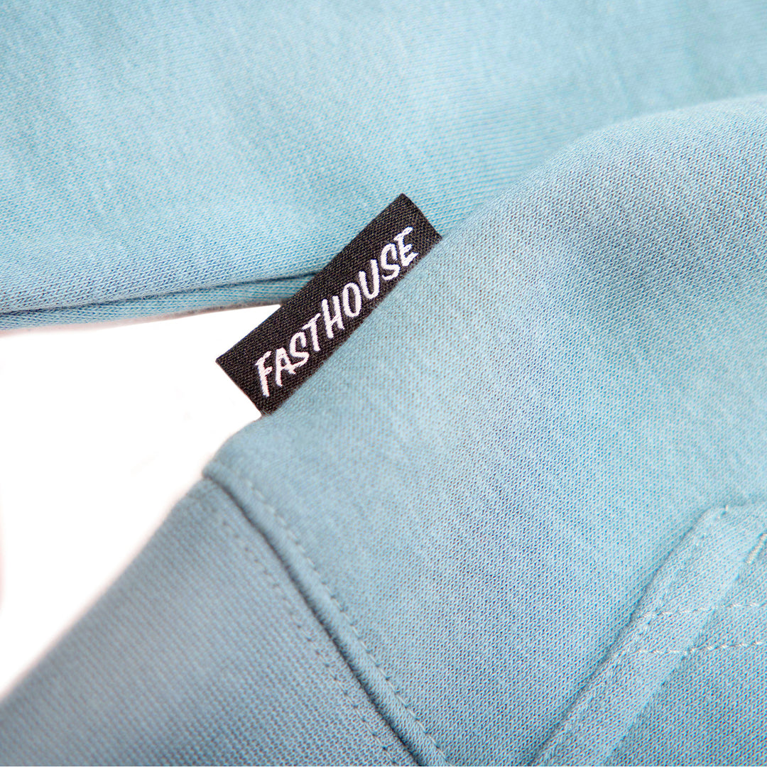 Fasthouse Women's Crown Hooded Zip-Up Denim - Close-Up of Logo Tag in Side Seam