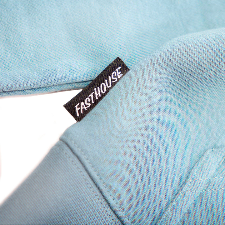 Fasthouse Women's Crown Hooded Zip-Up Denim - Close-Up of Logo Tag in Side Seam